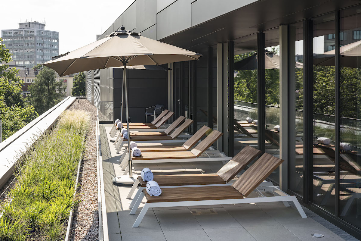 Sunbeds on terrace inside Meliá Frankfurt City