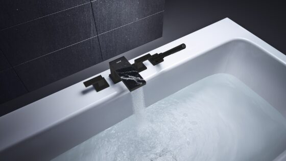 Matt black tap and large bath