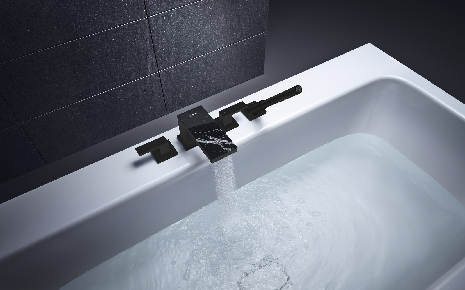 Matt black tap and large bath