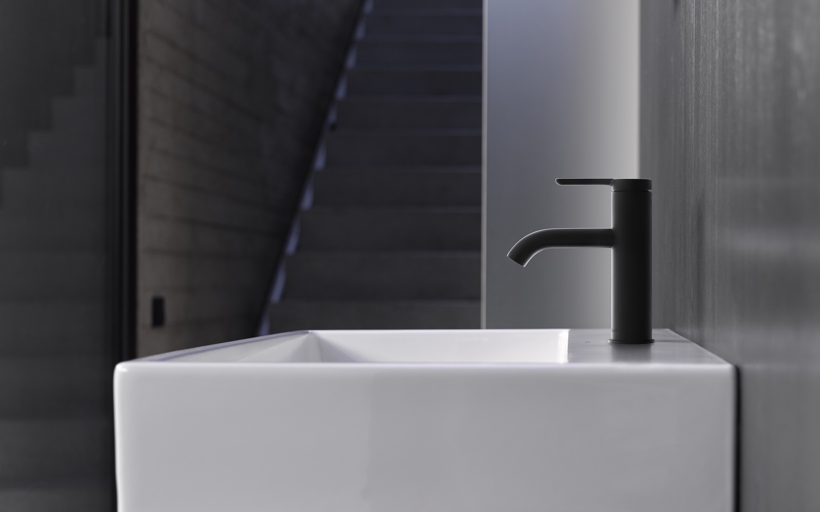 Black matte tap in modern bathroom