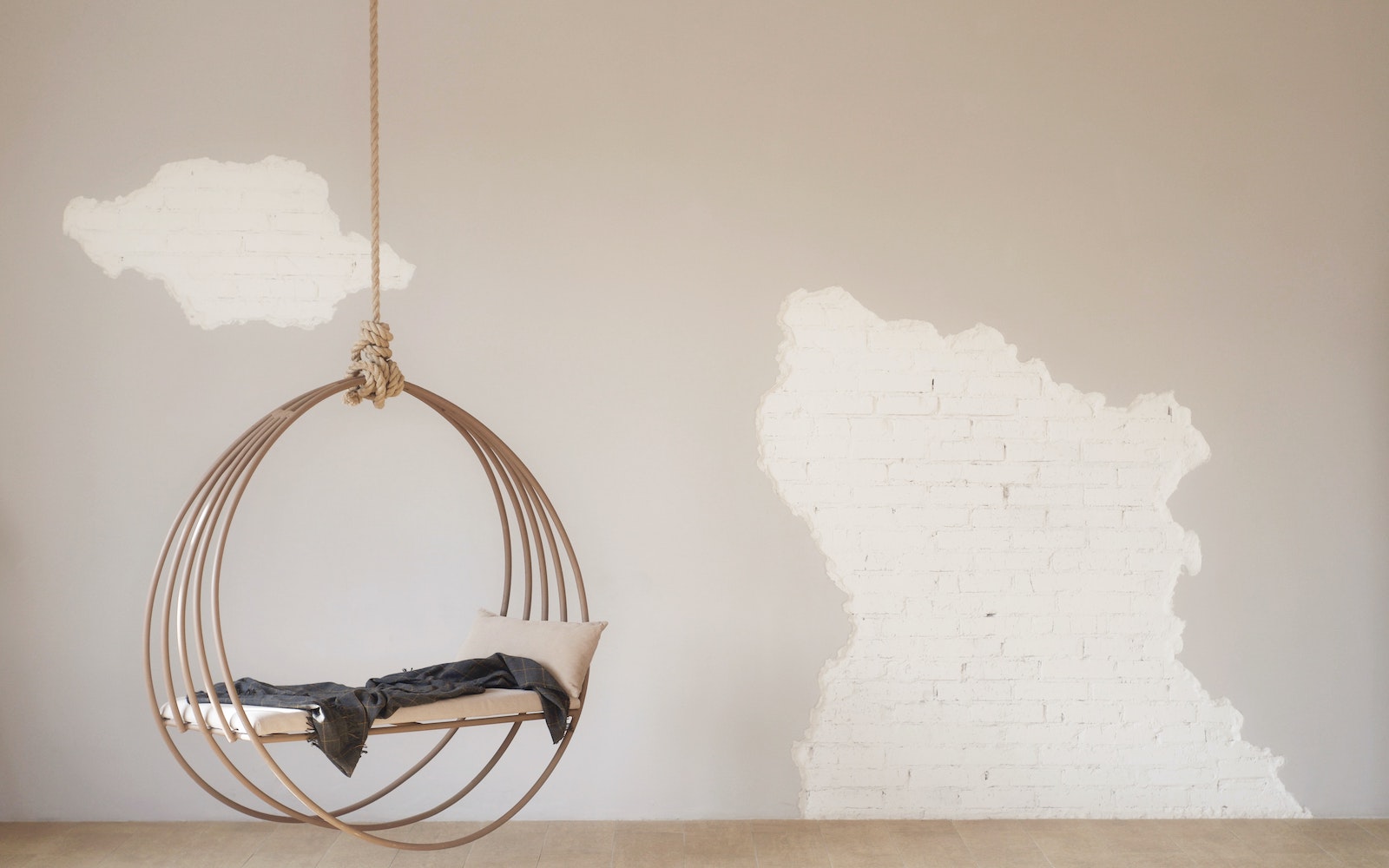 A interior swing with rustic wall