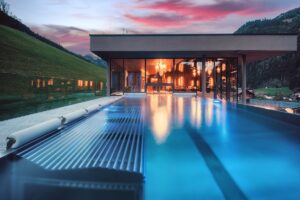 evening view across the infinity pool at Das Edelweiss