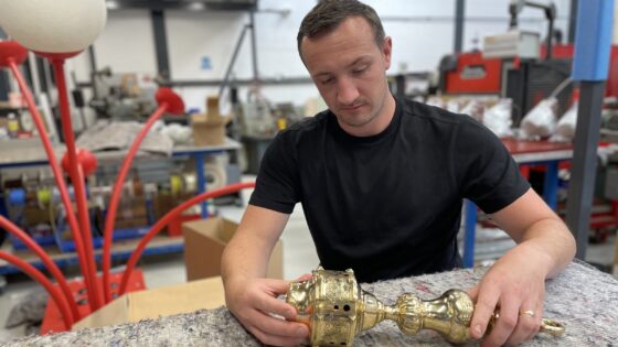 Michael Mulhall from Dernier & Hamlyn working on a light fitting in the workshop