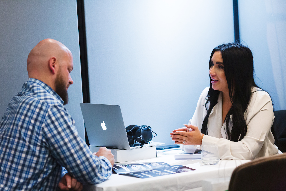 A man and a woman in a meeting