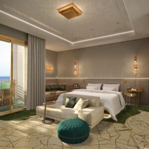 hotel guestroom with cream and gold patterned carpet, blue pouffe and gold light fittings on cream walls