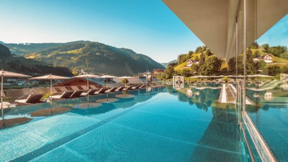 infinity pool and umbrellas at Das Edelweiss