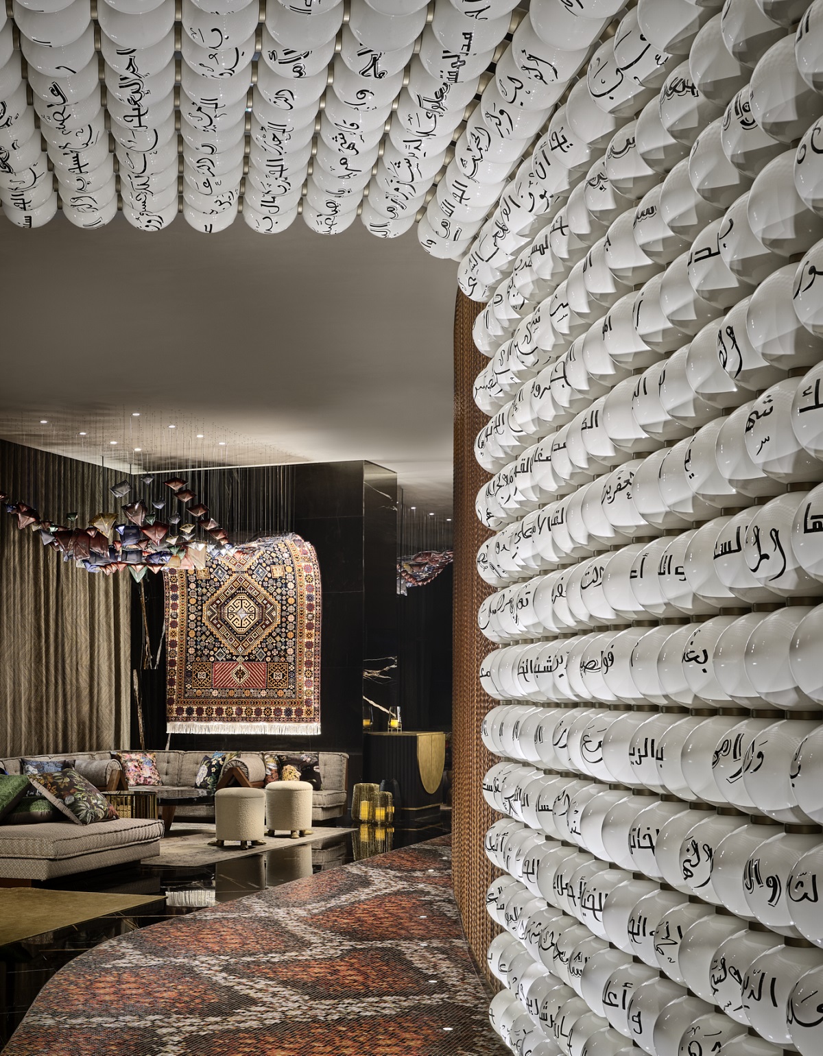 beaded feature wall by Stickman Tribe in lobby at W Mina Seyahi