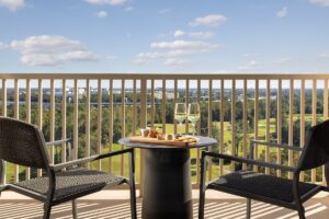 view from balcony over the golf course at Waldorf Astoria Orlando