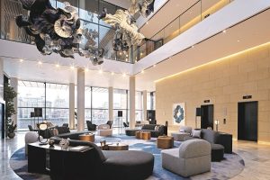 hotel lobby with central statement lighting installation in Westin St Pauls