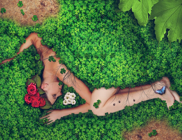 Woman lying in a greenery